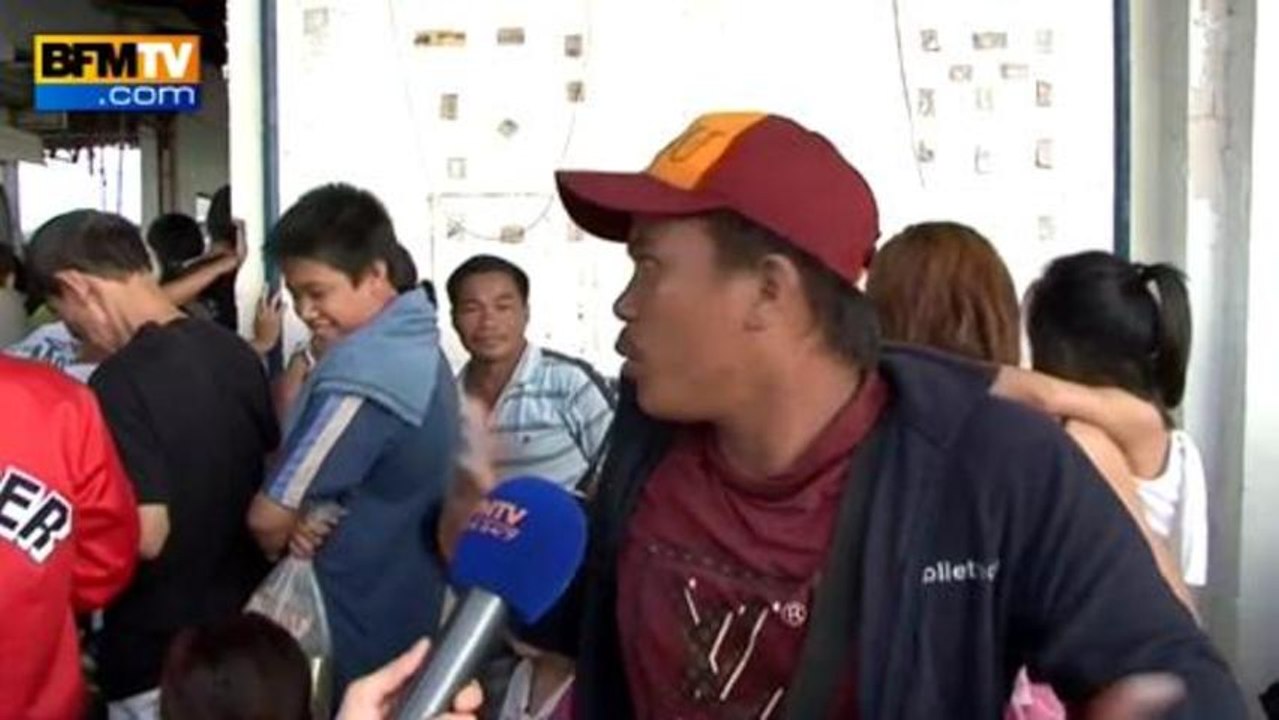 Reportage: les rescapés du typhon se pressent à l'aéroport de Tacloban - 12/11