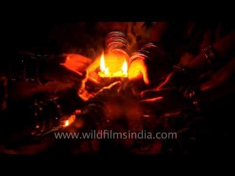 Devotees offer prayers to the sun during the Chhath festival on the banks of Yamuna