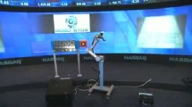 Robot arm rings NASDAQ bell