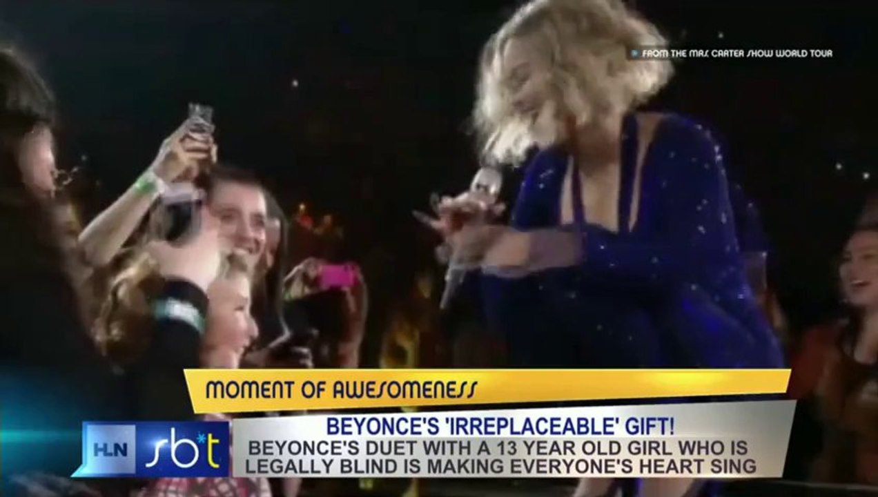 Beyonce sings duet with legally blind young girl.