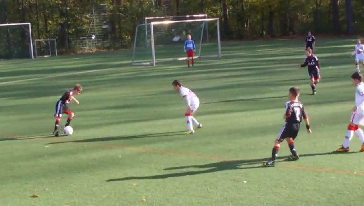 8 years old kid plays football like ZIDANE... Awesome young soccer player