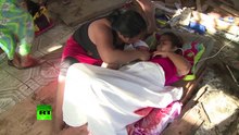 'Miracle' baby video: Girl born in Philippines typhoon rubble