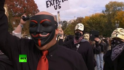 'We are Legion!' Video of hundreds of Anonymous activists marching in US & Brazil