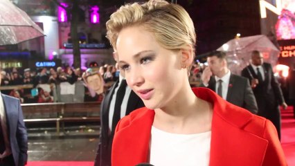 Jennifer Lawrence "feels guilty" at the  Catching Fire Hunger Games Premiere
