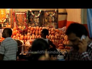 People enjoying street food during Durga puja in Kolkata