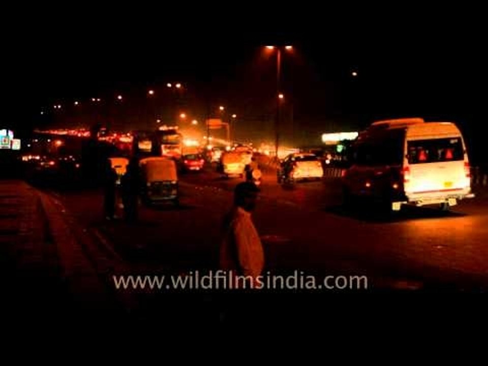 Ring Road car and truck traffic along Safdarjun...
