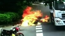 Dramatic CCTV:  Chinese motorcyclist set on fire after lorry
