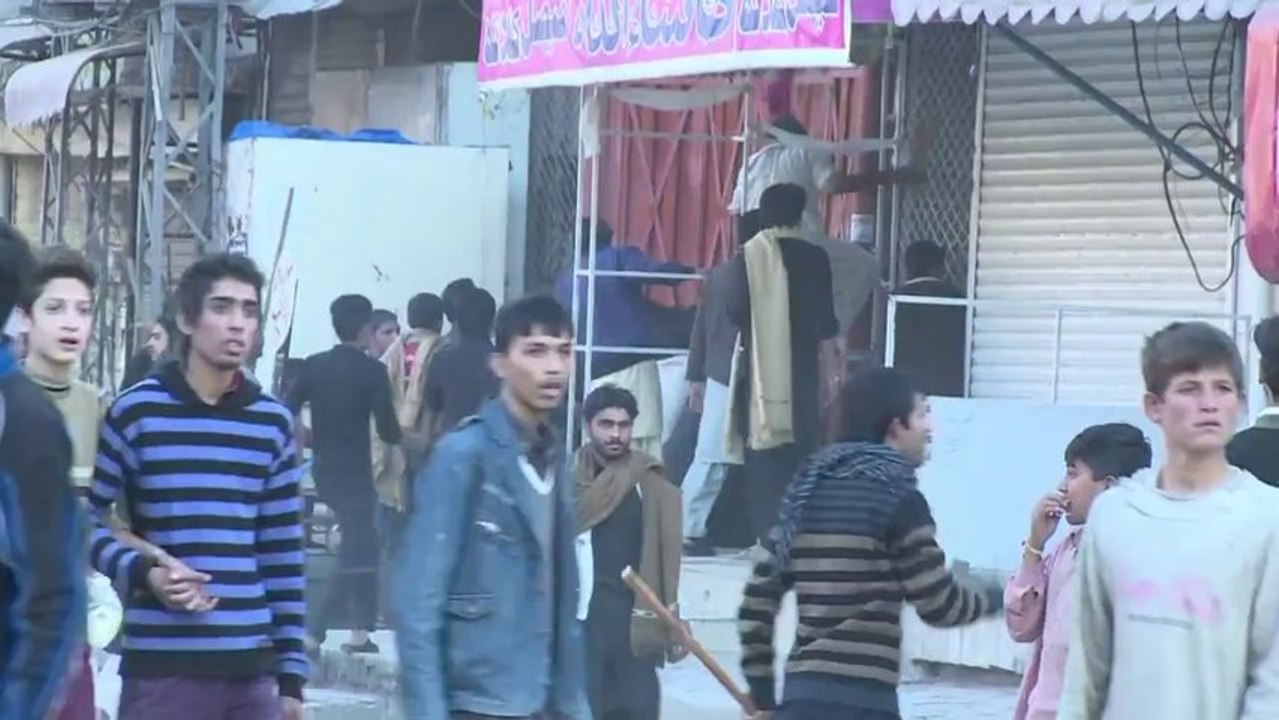 Evidence of Shia lynching Muslims, burning Mosque and property and attacking police van