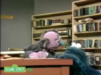 KURABİYE CANAVARI VE KÜTÜPHANE GÖREVLİSİ