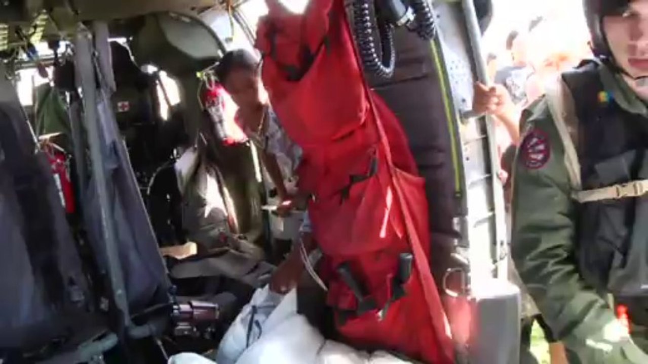 US delivers food supplies to isolated typhoon victims