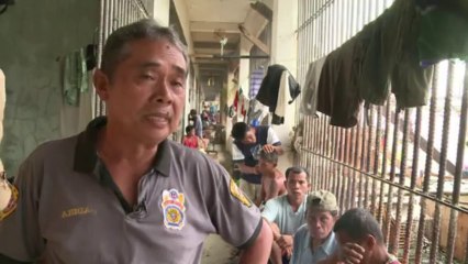 Philippine prisoners return after typhoon mass escape