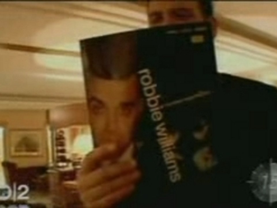 Robbie Williams - Something Beautiful