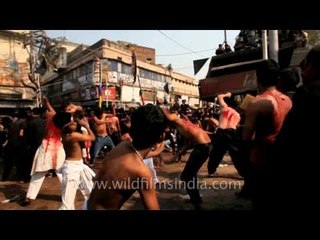 Inflicting themselves with knife