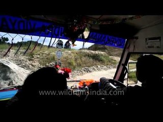 Riding a bus to school in Ziro