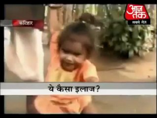 Indian Baba Blessing Babies by Standing on Them