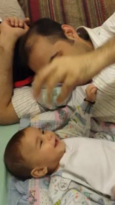 Arham khan playing with his Baba