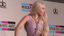 Lady Gaga, Katy Perry and Christina Aguilera pose for photos at the AMAs carpet