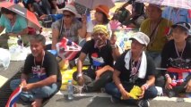 Manifestantes tailandeses toman varios ministerios para exigir la dimisión de Yingluck Shinawatra