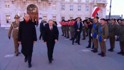 Russia's Putin given military honors in Italy