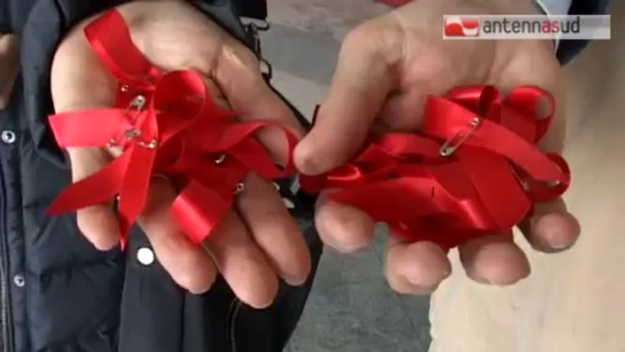 TG 25.11.13 Bari si mobilita contro la violenza sulle donne con nastri e scarpe rosse