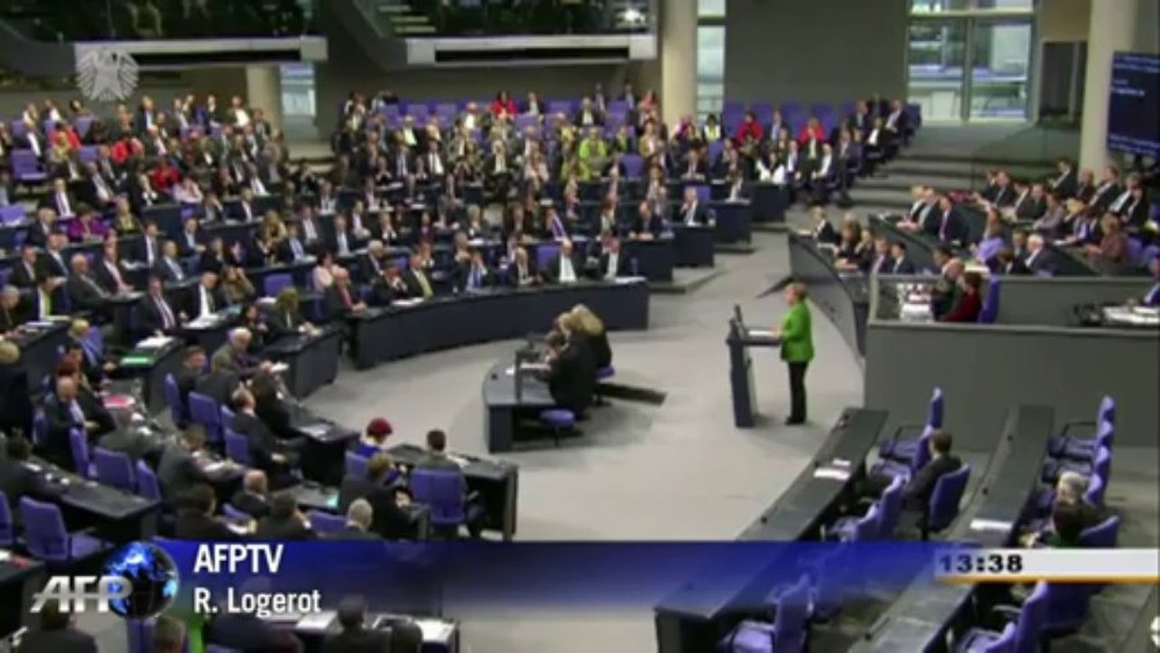 Merkel agrees coalition with Social Democrats