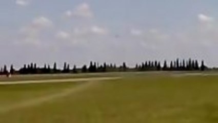 Pilot scares his army buddies with low pass flight
