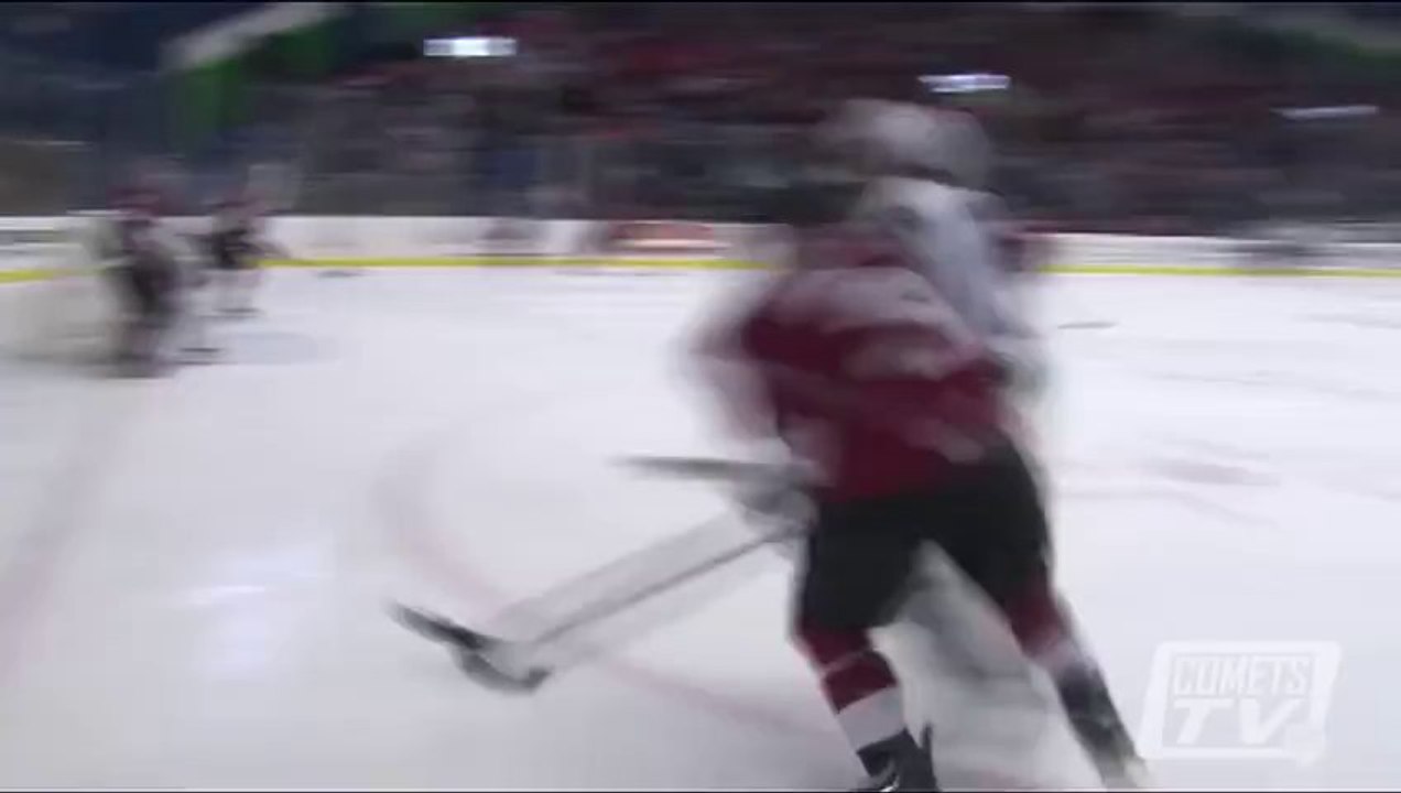 Hockey player flips upside down after earth-rattling check
