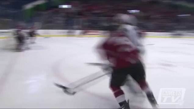 Hockey player flips upside down after earth-rattling check