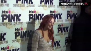 Lindsay Lohan arrives at Mr. Pink energy drink launch party