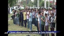 Mourners bury Egyptian student killed in Islamist demo