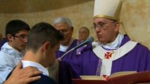 Pope holds mass at parish in the outskirts of Rome