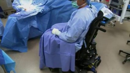 Paralyzed surgeon overcomes the odds