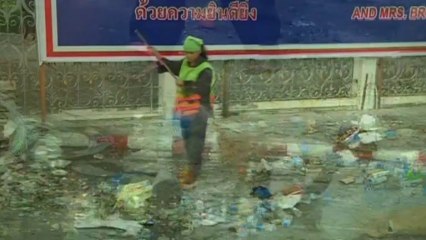 Protesters in Bangkok prepare to clean up streets for King's birthday.