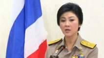Thai PM calls for peace, urges protesters to talk