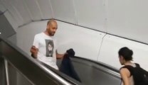 Dumb guy walking on escalator : WRONG WAY DUDE!!!