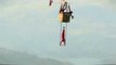 Norwegian Daredevil Performs on Trapeze Suspended by Hot Air Balloon