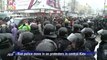 Ukrainians keep up protests as riot police move in