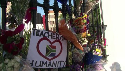 Tears, dancing as S.Africa MPs remember Mandela