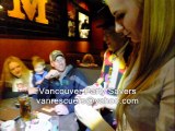 Vegas style magic tricks performed table-to-table at Mr. Mike's Casual Vancouver by magician with spotlights
