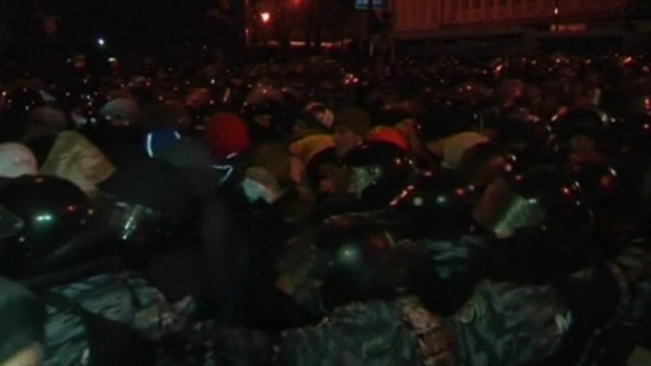 Ukraine protesters scuffle with police