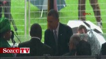 Obama, Küba lideriyle el sıkıştı