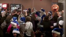 Santaclaus giving gifts at Airport Arrival !! WestJet Christmas Miracle