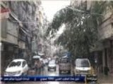 معاناة أهالي حلب مع الثلج والبرد والقصف