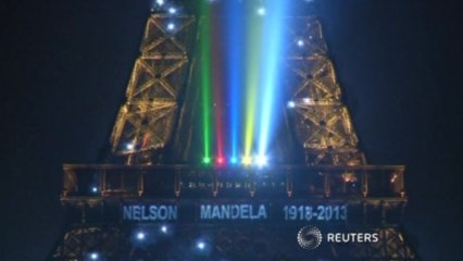 Eiffel Tower lights up for Mandela