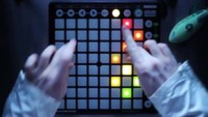 Guy plays Tetris on a Launchpad