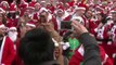 Hundreds of Santas bring festive cheer to London