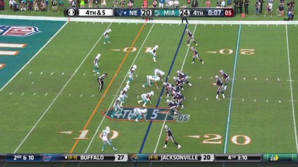 Michael Thomas intercepts a pass from Tom Brady