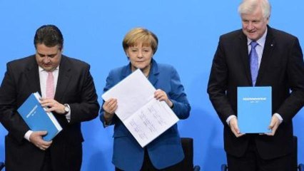 Germany's Merkel forms coalition government