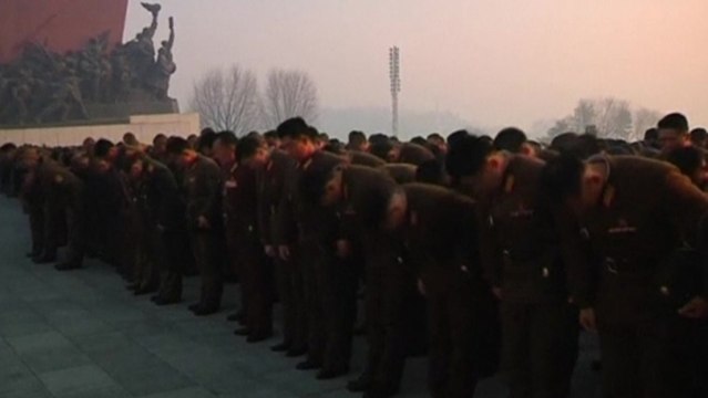 Floral tributes mark Kim Jong Il's death anniversary