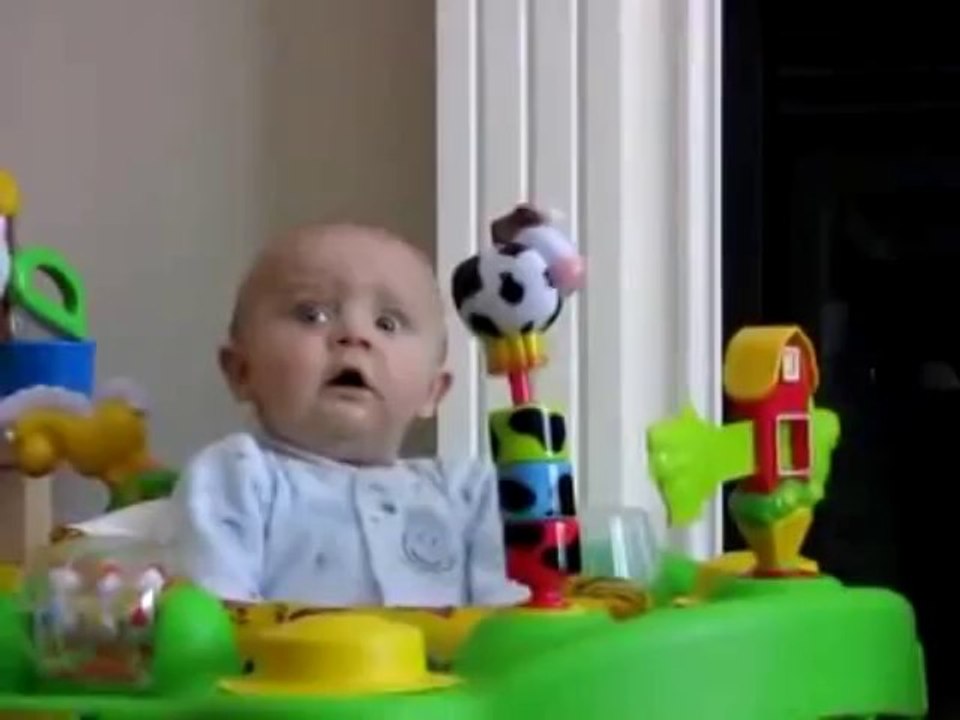 Baby Laughing Hysterically at Ripping Paper (Original)_clip9